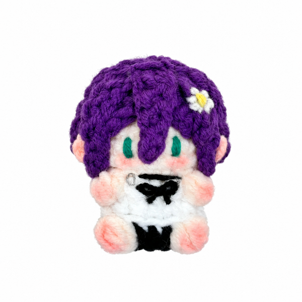 Handmade Chainsaw Man Reze crochet charm on a white background