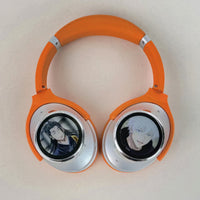 Dual-Screen headphones viewed from above with artwork on both earcups
