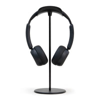 Black Custom Anime Display Headphones, front view on a photography stand