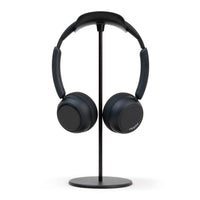 Black Custom Anime Display Headphones, rear view on a photography stand