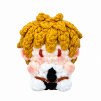 Handmade Chainsaw Man Denji crochet charm on a white background