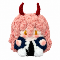 Handmade Chainsaw Man Power crochet charm on a white background