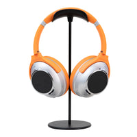 Dual-Screen ANC Headphones in orange, full front view on a photography stand
