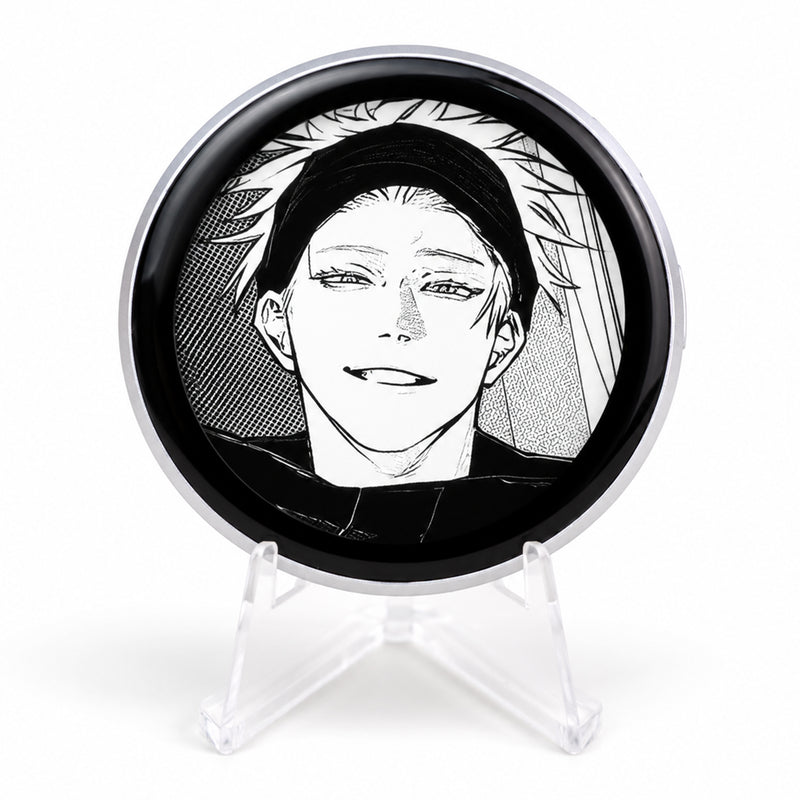 E-Badge Display showing black and white manga artwork on a clear photography stand